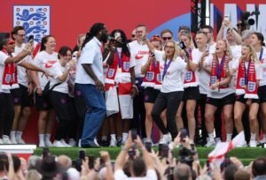 Wiegman Dances with Burna Boy at Lionesses’ Parade