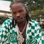 Chaos at Cotonou: Fan Storms Stage to Attack Naira Marley